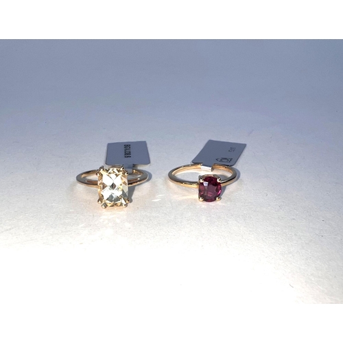 663 - 2 9 carat hallmarked gold dress rings, 1 set with a Malawi Garnet 1.21 carats, the other with a pale... 