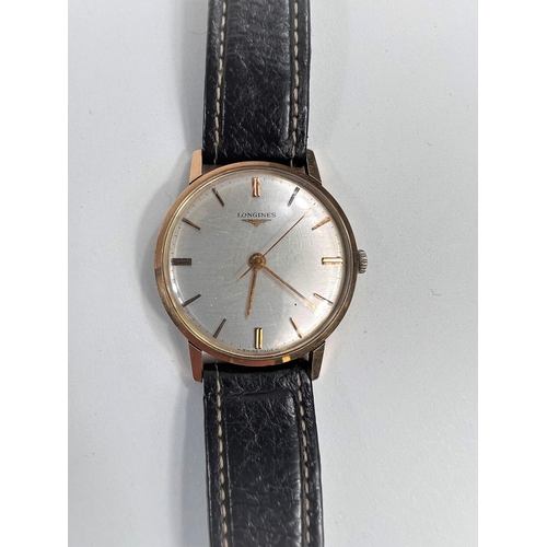 679 - A 1970's Longines Gent's wristwatch with baton markers, hand winding movement, on later leather stra... 