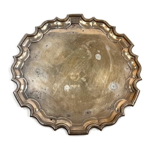 701 - A Georgian style hallmarked silver salver with wavy rim, with presentation inscription, Sheffield 19... 