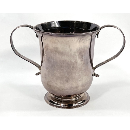 703 - A mid Georgian baluster loving cup with 2 handles, on raised foot, Newcastle 1756, maker John Langla... 