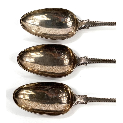 747 - A set of three silver basting spoons, feather banded, Old English bottom marked, 2 decorated with fi... 