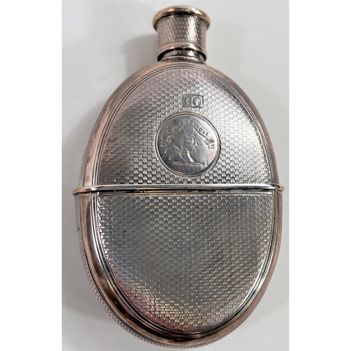 771 - A silver hip flask and stirrup cup with engine turned decoration and circular crest 'Suum Cuique' wi... 