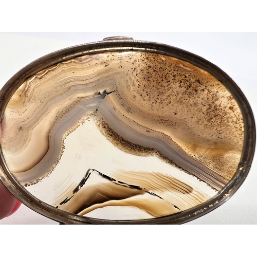 785 - An oval silver snuffbox, banded agate top, Birmingham, 1901, maker F.G.T. 6cm