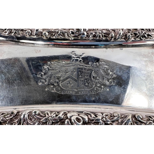 791 - A late George III silver snuffer tray with cast border decorated with flowers, engraved armorial, Sh... 