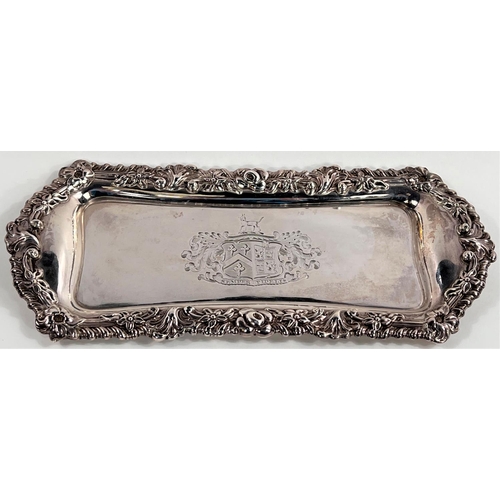 791 - A late George III silver snuffer tray with cast border decorated with flowers, engraved armorial, Sh... 