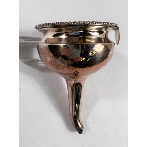 794 - A George III silver wine funnel in two parts with connecting ring (unmarked), London, 1786, maker EB... 