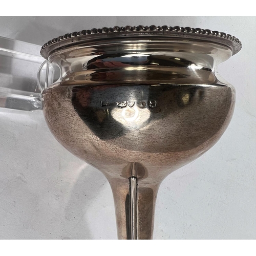 794 - A George III silver wine funnel in two parts with connecting ring (unmarked), London, 1786, maker EB... 