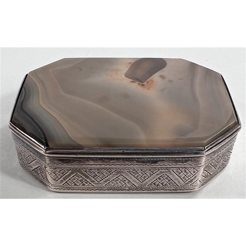 796 - An early 19th century silver snuff box inset agate top of shaped octagonal form, parcel gilt interio... 