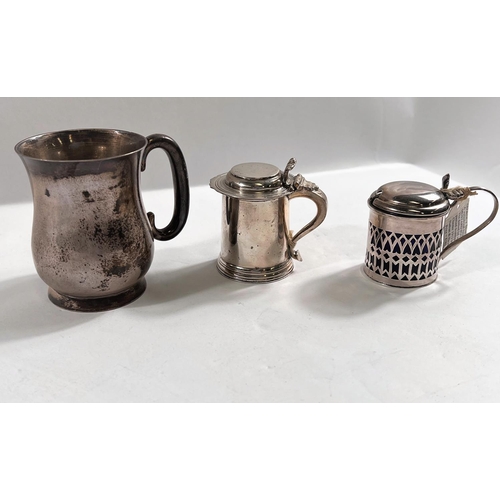 813 - A silver christening cup of baluster form, Birmingham, 1916 and two silver mustard pots of the same ... 