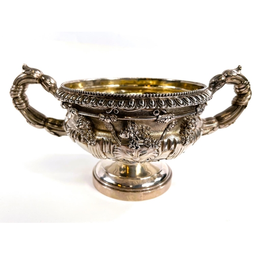 816 - A William IV silver and parcel gilt two handled vase modelled after the Warwick Vase, reeded and aca... 