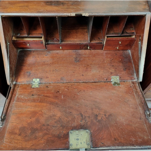 903 - A Georgian mahogany fall front bureau with three drawers bellow and fitted interior, 71x97cm 