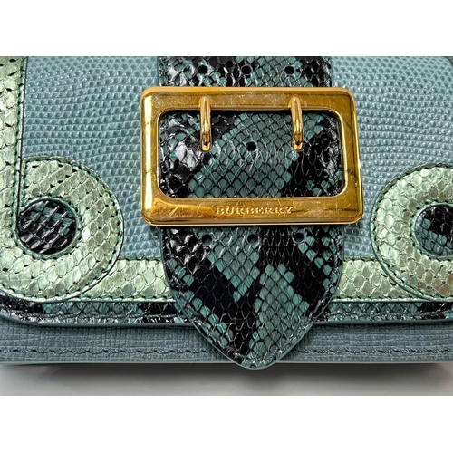 91 - BURBERRY - a purse/small clutch with snakeskin and leather in various shades of green, large gilt fr... 