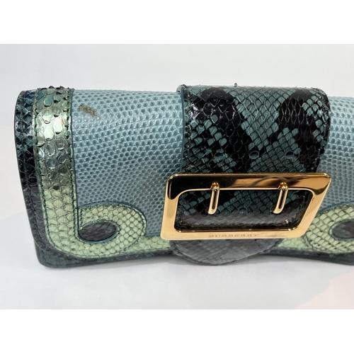 91 - BURBERRY - a purse/small clutch with snakeskin and leather in various shades of green, large gilt fr... 