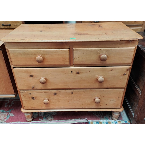 926 - A Victorian stripped pine chest of 2 long and 2 short drawers