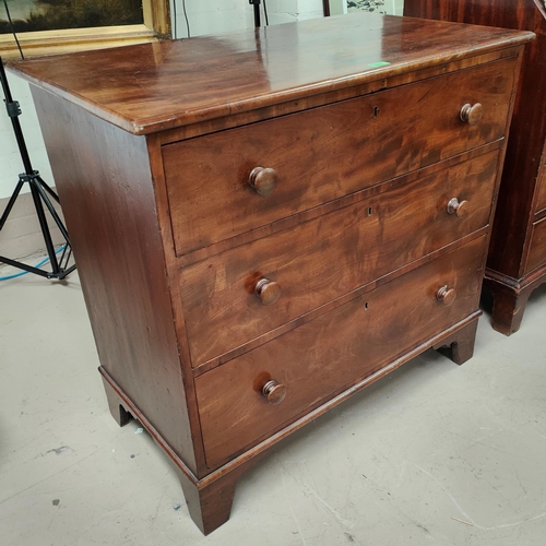 941 - A 19th century mahogany chest of 3 long drawers with knob handles, on bracket feet, width 93cm