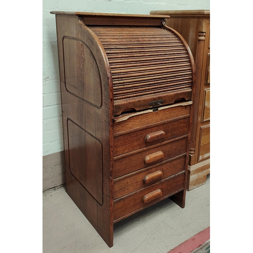 947 - An unusually narrow oak cabinet with roll top and 4 drawers below, width 55cm (locked, no key a.f)