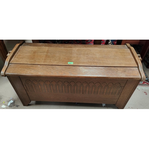 953 - A reproduction oak coffer, length 106cm