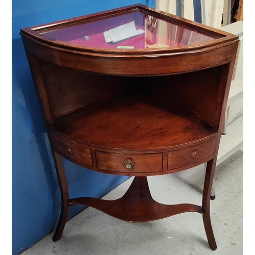 973 - A mahogany corner fitting bijouterie top display with shelf and drawer under