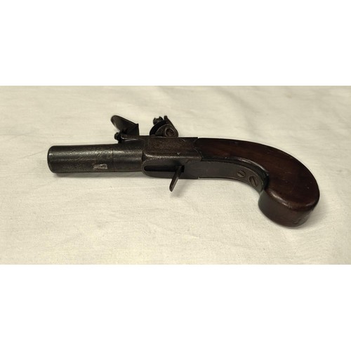 82 - A 19th century muff/pocket flintlock pistol, muzzle loading with mahogany grip, named 'H Nock London... 