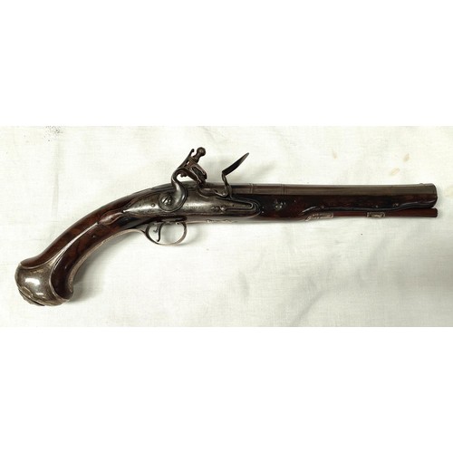 86 - A 19th century flintlock pistol, muzzle loading with white metal mounted decoration and relief carvi... 