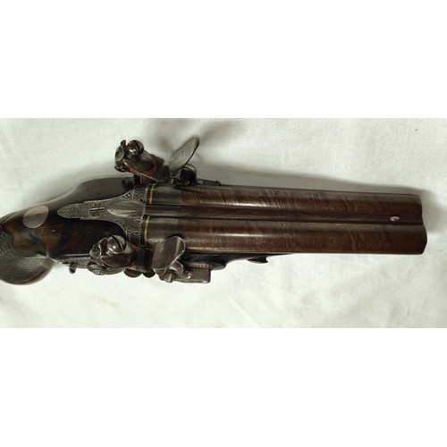 87 - A 19th century carriage pistol, side by side double barrelled, gold bands at breech, engraved metalw... 