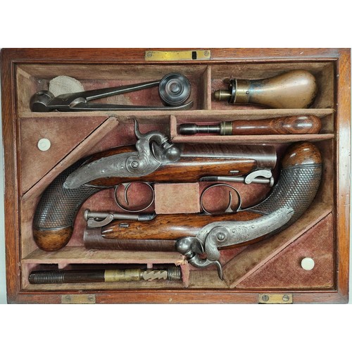 89 - A cased pair of 19th century Irish travelling pistols by Trulock & Son, Dublin, engraved to top ... 