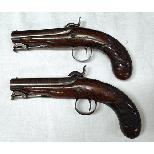 89 - A cased pair of 19th century Irish travelling pistols by Trulock & Son, Dublin, engraved to top ... 