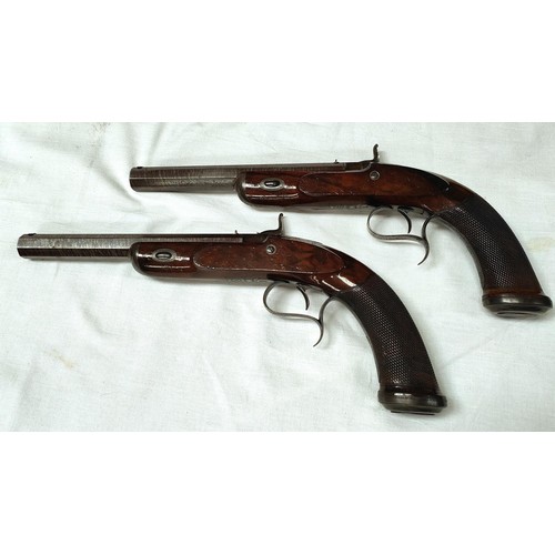 90 - A 19th century pair of duelling/target percussion cap pistols, by William & Powell, Liverpool, e... 