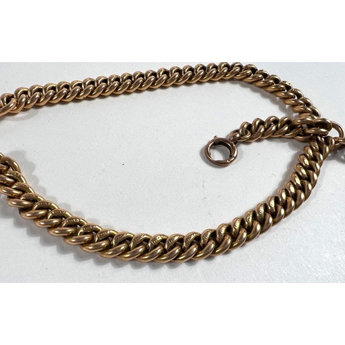 649 - An 18 carat hallmarked gold curb chain double Albert with bar and twin clips, 86.8gm