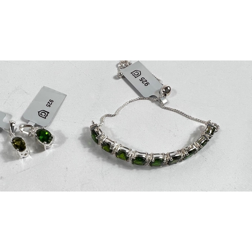 661A - A chrome diopside (9) and white Zircon (20) hallmarked silver slider bracelet; a chrome diopside hal... 