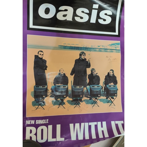 198 - The Stone Roses:  signed poster; Oasis poster signed by three members of the band