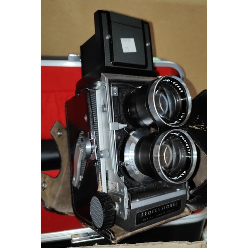 71 - A Mamiya C3 Professional TLR camera with f4.5 135mm lenses