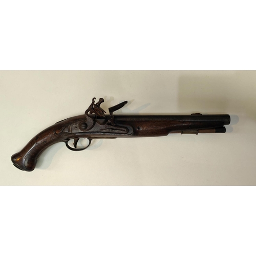 78B - An Austrian Military flintlock pistol with brass mounts, fish tail stock, brass side tangs and cap, ... 