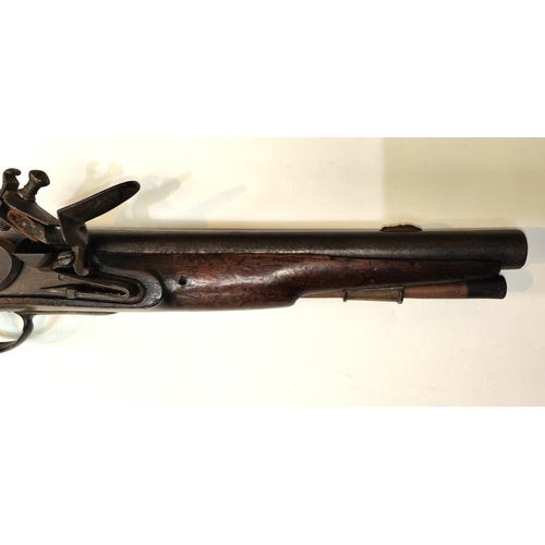 78B - An Austrian Military flintlock pistol with brass mounts, fish tail stock, brass side tangs and cap, ... 