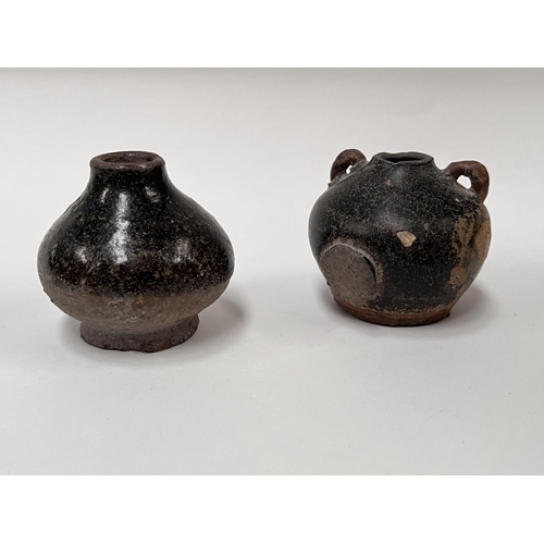 451 - A Chinese small ceramic whistle; 2 Cambodian small vases with dark mottled glaze, possibly Khmer, he... 