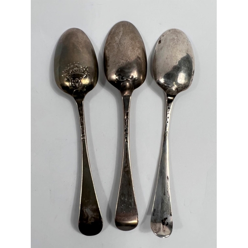 751 - An 18th century silver tablespoon with picture back, London 1774; 2 other 18th century spoons, 5.3oz... 