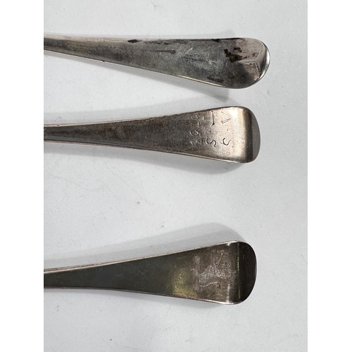 751 - An 18th century silver tablespoon with picture back, London 1774; 2 other 18th century spoons, 5.3oz... 