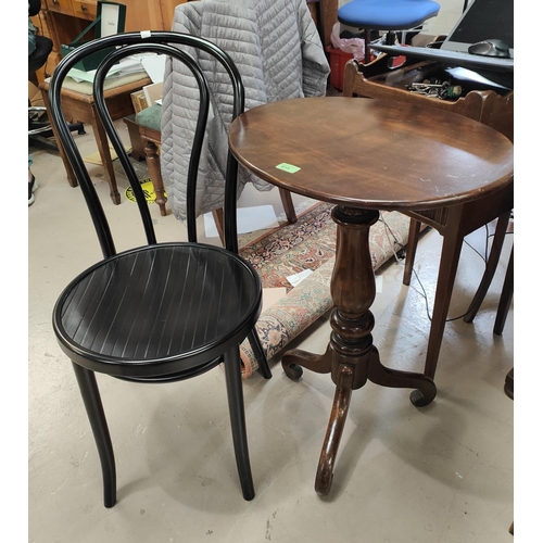 915 - An early 19th century mahogany table with oval tilt top, on turned column and 3 splay feet; a 3 heig... 