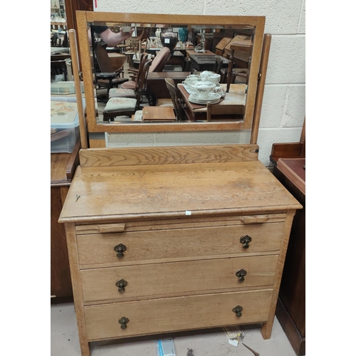 921 - A 1930's light oak 3 height dressing table and chest of drawers with brushing slides