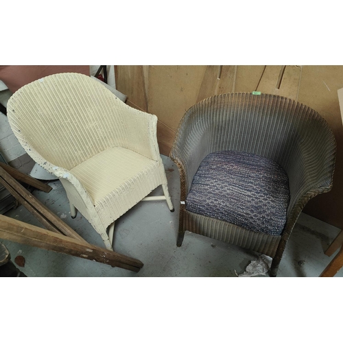 923 - Two Lloyd Loom armchairs and a linen basket