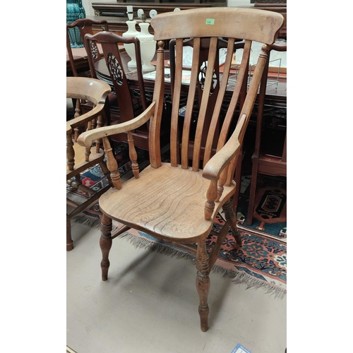 930 - A 19th century lath back armchair