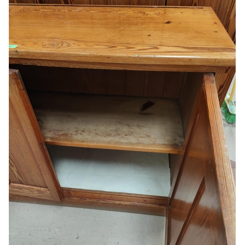 932 - A pitch pine 2 door side cabinet