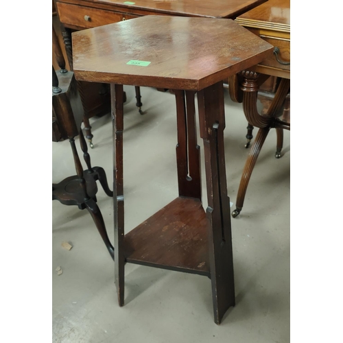 935 - An Edwardian mahogany hexagonal plant stand of 2 tiers; a similar circular stand