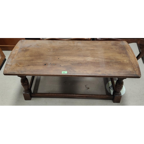 940 - A Jacobean style oak coffee table with rectangular top