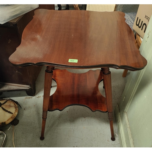 968 - An Edwardian shaped square top 2 tier occasional table on reeded legs