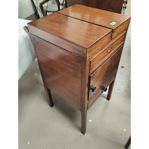 970 - A Georgian mahogany fold out wash stand with stained legs, ceramic bowl to the interior (a.f)