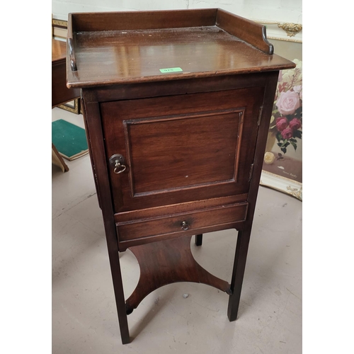 975 - A Victorian mahogany pot cupboard with single drawer, door and shelf below