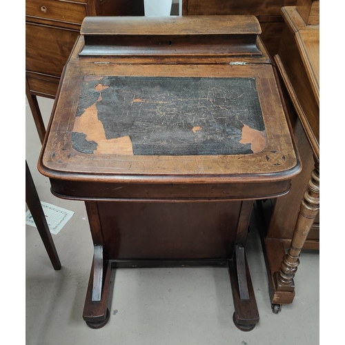 995 - A mahogany Davenport with inlaid decoration, drawers to one side with four drawers on the other