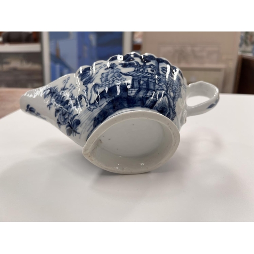 490 - A Chinese blue and white gravy boat made for export market with traditional scenes, three Chinese gi... 