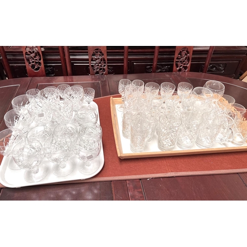 557 - A large selection of cut and other drinking glasses and glassware